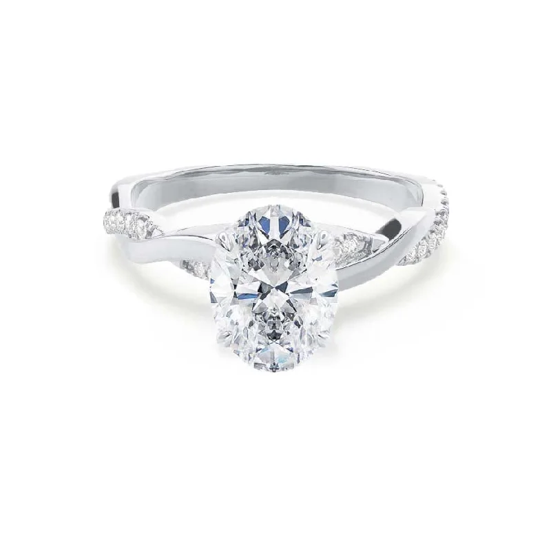 Cushion - cut diamond engagement ring with a halo of moissanite in a silver - plated bandEDEN - Oval Lab Diamond Platinum Vine Solitaire