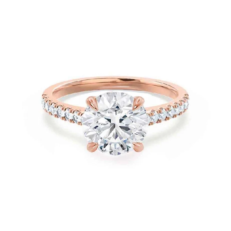 Three - stone diamond engagement ring in rose gold, symbolizing past, present, and futureVIOLA - Round Lab Diamond 18k Rose Gold Shoulder Set