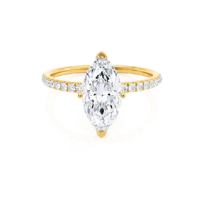 Oval - cut sapphire and diamond engagement ring in 18K white goldMACY - Marquise Moissanite 18k Yellow Petite Solitaire Ring