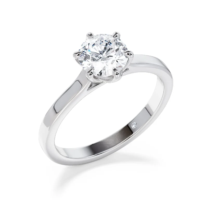 Halo diamond engagement ring in 18K white gold with a center oval - cut stoneQueensway