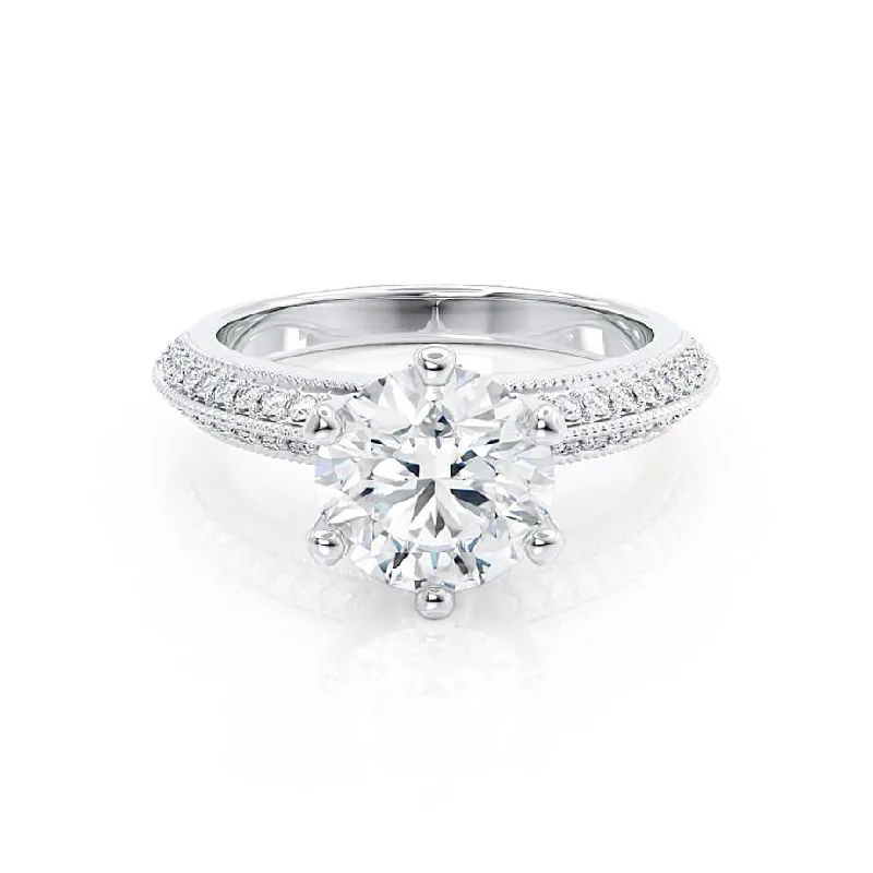 Pear - shaped diamond engagement ring with side baguette diamonds in 18K goldVICTORIA - Round Lab Diamond 950 Platinum Shoulder Set Ring