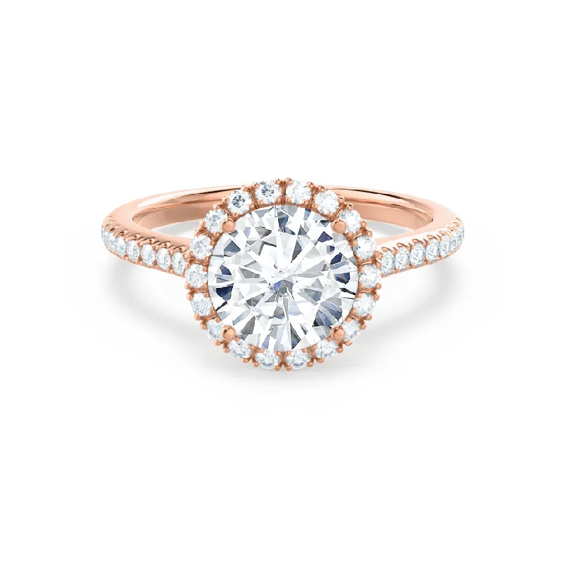 Pear - shaped diamond engagement ring with side baguette diamonds in 18K goldLAVENDER - Round Moissanite & Diamond 18k Rose Gold Petite Halo Ring