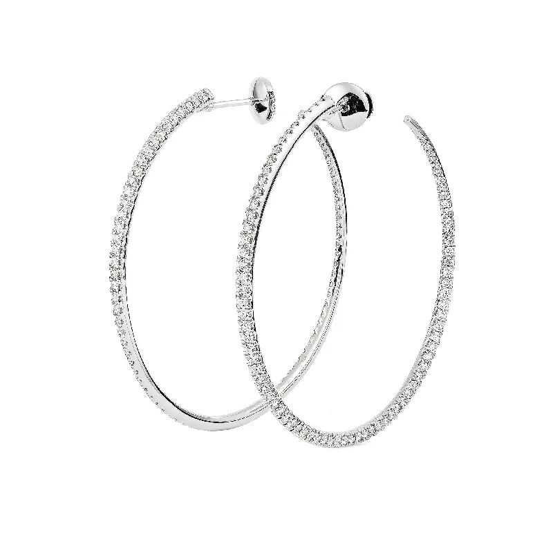 Statement hoop earringsTwisted 45 mm 18K Whitegold Creoles w. Diamonds