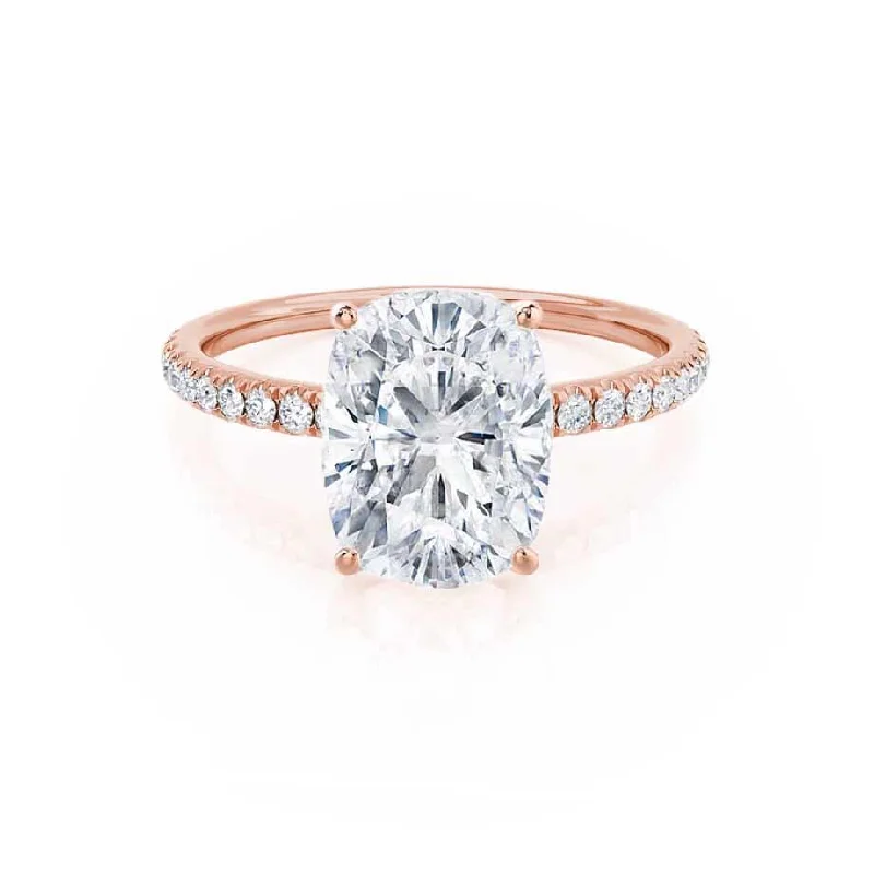 Halo diamond engagement ring in 18K white gold with a center oval - cut stoneMACY - Elongated Cushion Moissanite & Diamond 18k Rose Gold Petite Pavé Ring