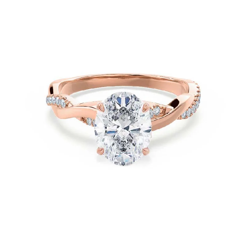 Halo diamond engagement ring in 18K white gold with a center oval - cut stoneEDEN - Oval Lab Diamond 18k Rose Gold Vine Solitaire