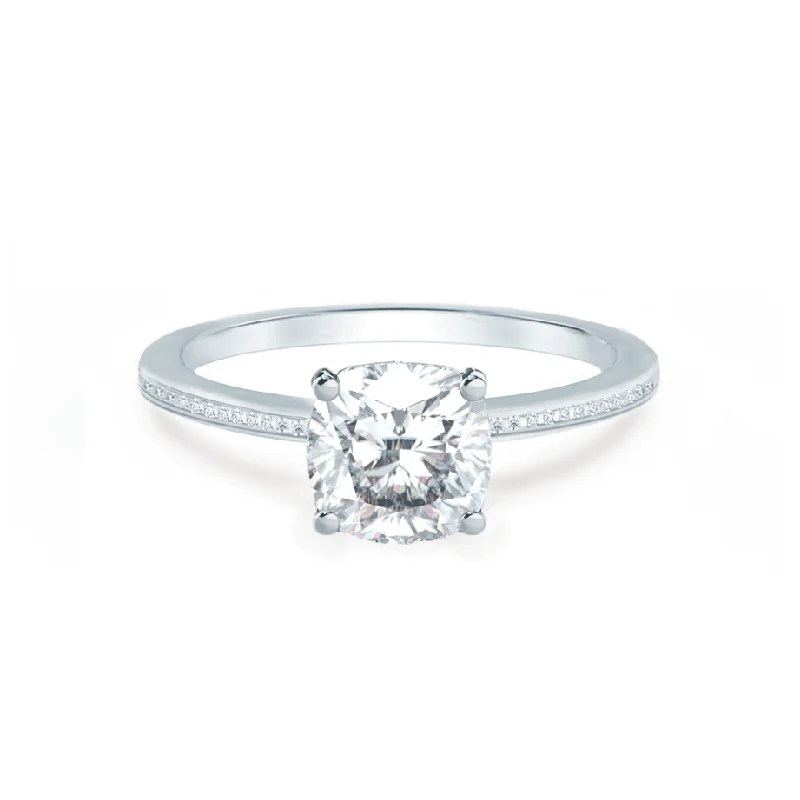 Aquamarine and diamond engagement ring in a 18K white - gold setting with a scalloped edgeIRIS - Cushion Moissanite 18k White Gold Petite Channel Set Ring