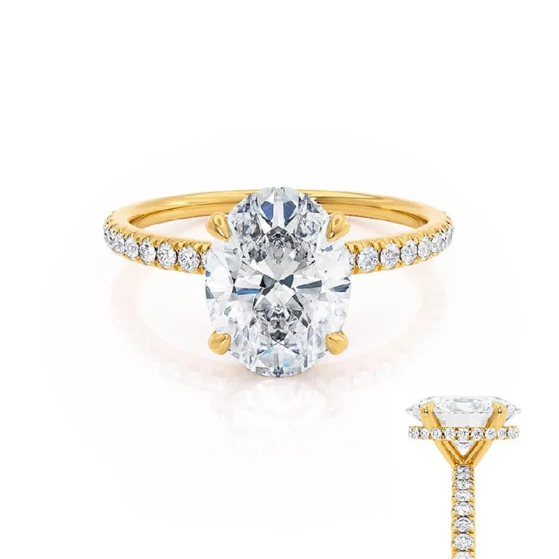 Vintage - style engagement ring with filigree details and sapphire accents in 14K yellow goldLIVELY - Ready to Ship 0.32ct Oval Lab Diamond 18k Yellow Gold Petite Hidden Halo Pavé Shoulder Set