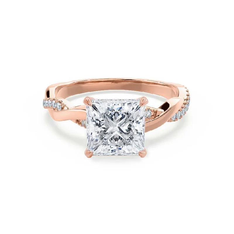 Emerald - cut diamond engagement ring set in a modern titanium bandEDEN - Princess Moissanite & Diamond 18k Rose Gold Vine Solitaire