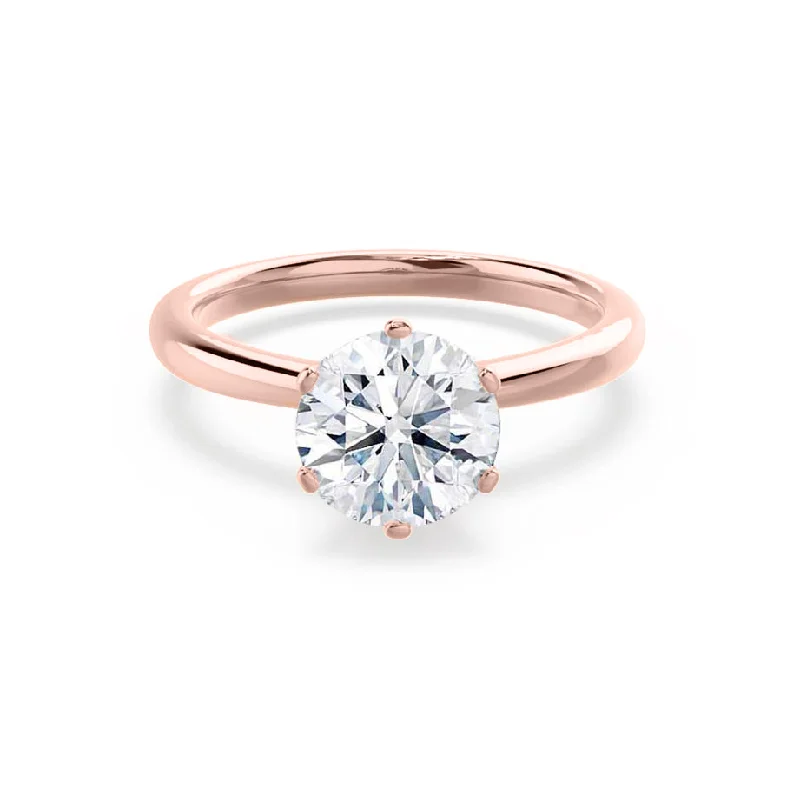 Oval - cut sapphire and diamond engagement ring in 18K white goldSERENITY - Round Lab Diamond 18k Rose Gold Solitaire Ring