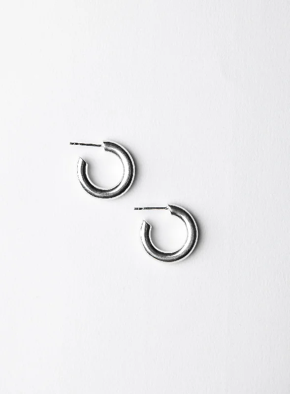 Huggie hoop earringsSmall Shiny Silver Hoops