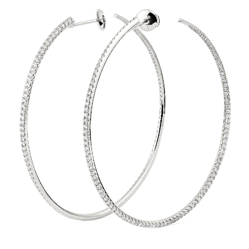 Trendy hoop earringsTwisted 60 mm 18K Whitegold Creoles w. Diamonds