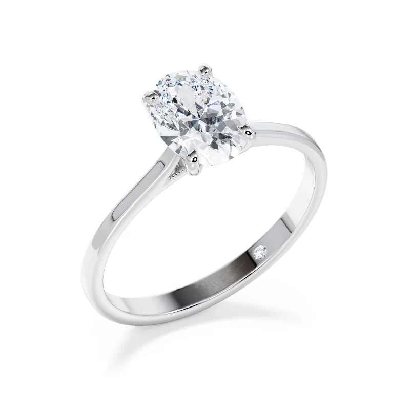 Round - cut diamond engagement ring with a twisted band design in 14K white goldHoxton (Oval)