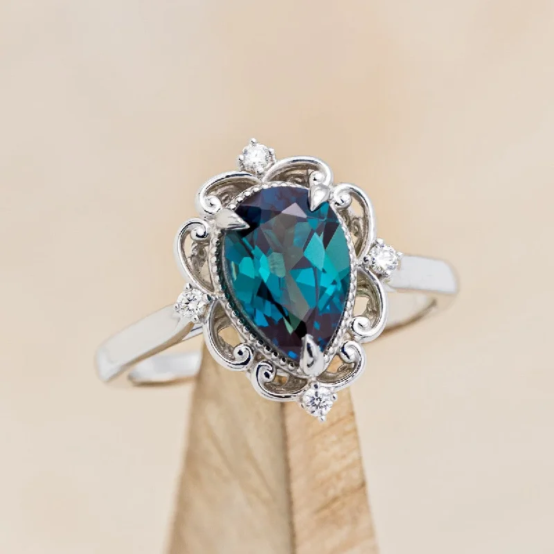 Men's Black Onyx Engagement Rings Set in Titanium for a Modern and Bold Look"VERA" - PEAR SHAPED LAB-GROWN ALEXANDRITE ENGAGEMENT RING WITH DIAMOND ACCENTS