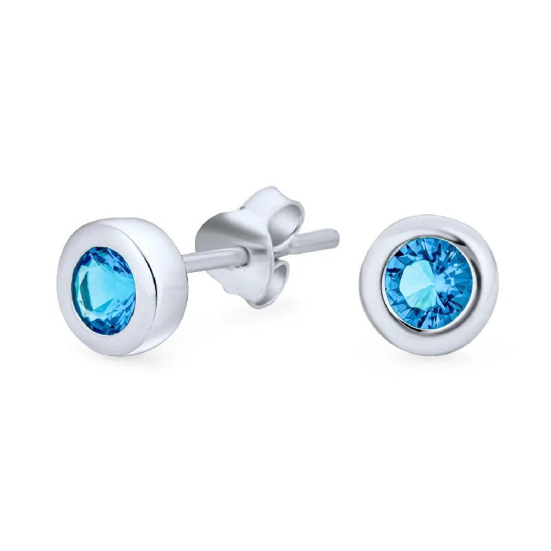 Men's Stainless Steel Skull Stud Earrings with Black Enamel for an Edgy and Rock - Inspired StyleLondon Blue .50 CT CZ Stud Earrings Bezel Set Round Sterling Silver Simulated Topaz