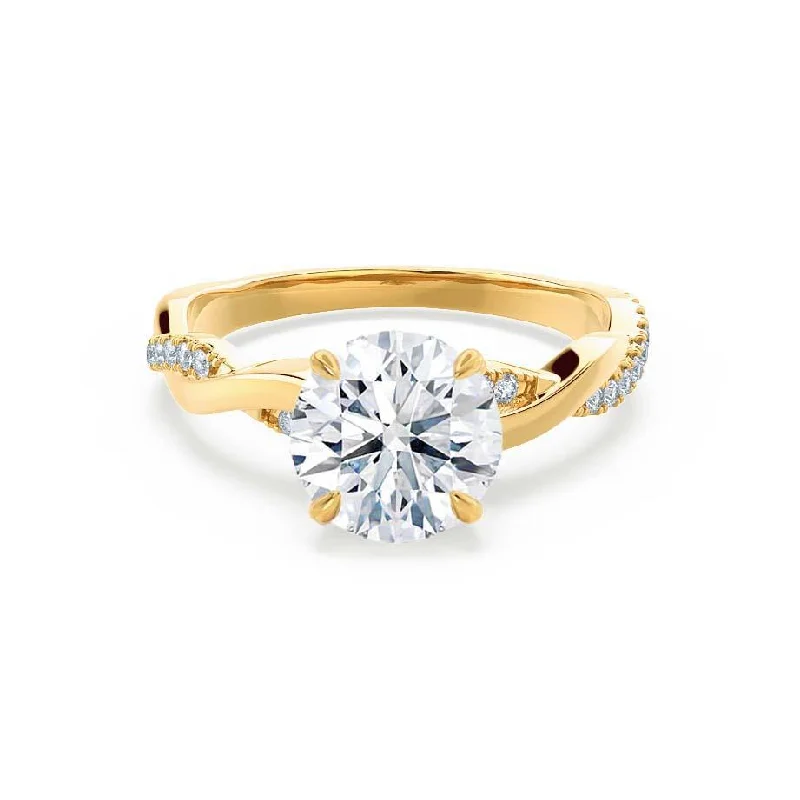 Vintage - style engagement ring with filigree details and sapphire accents in 14K yellow goldEDEN - Round Moissanite & Diamond 18k Yellow Gold Vine Solitaire Ring