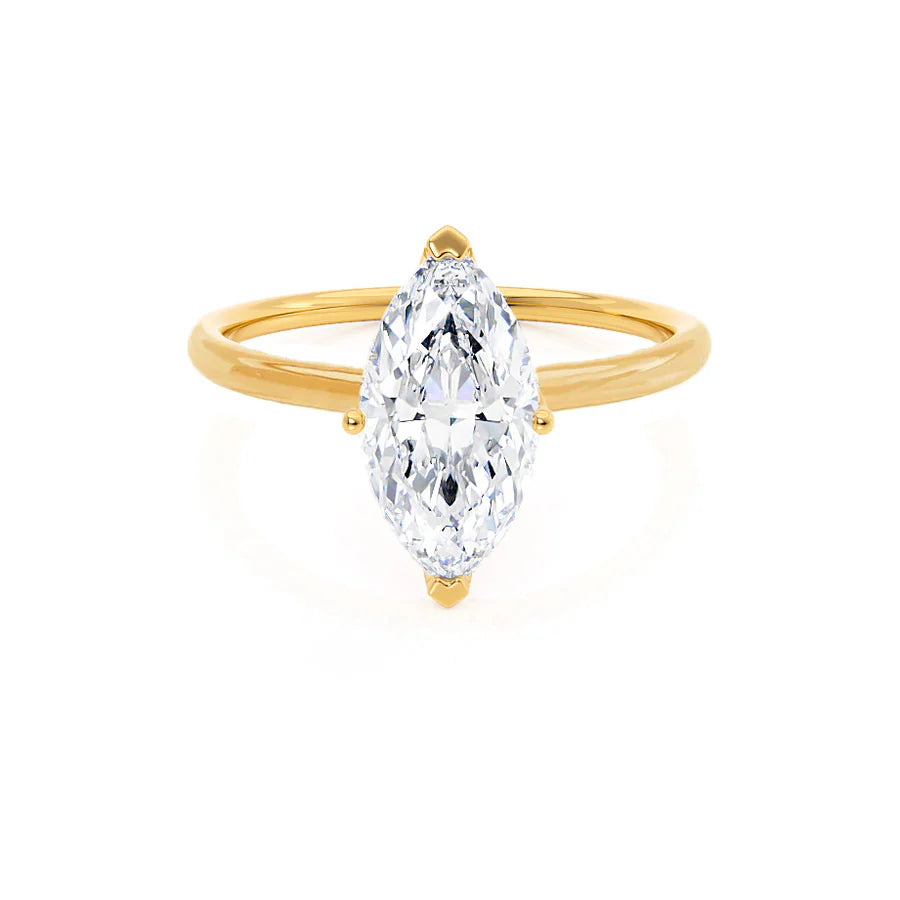 Opal and diamond engagement ring in a contemporary silver band with black - rhodium accentsLULU - Marquise Lab Diamond 18k Yellow Gold Petite Solitaire