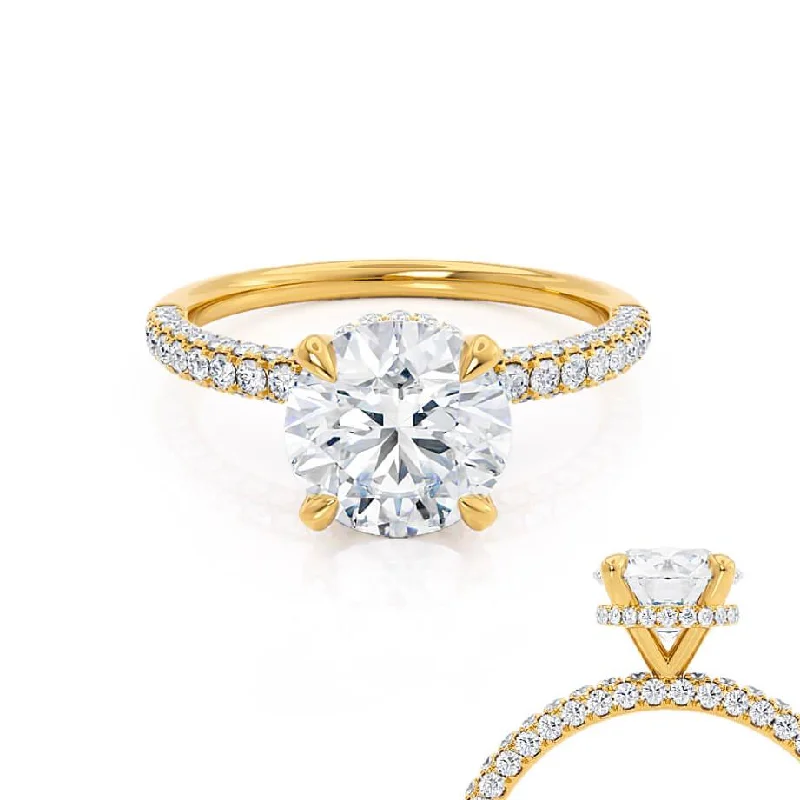 Three - stone diamond engagement ring in rose gold, symbolizing past, present, and futureCOCO- Round Moissanite & Diamond 18k Yellow Gold Petite Hidden Halo Triple Pavé Shoulder Set Ring