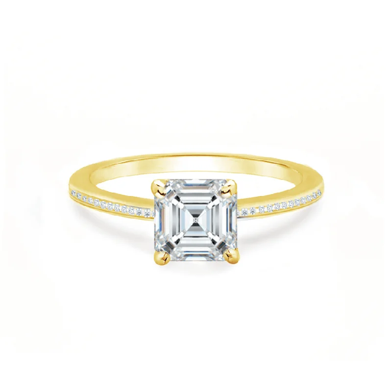 Three - stone diamond engagement ring in rose gold, symbolizing past, present, and futureIRIS - Asscher Moissanite 18k Yellow Gold Petite Channel Ring