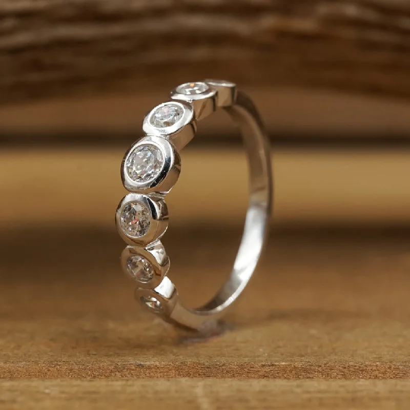 Engagement - Inspired Women's Rings with a Halo of Small DiamondsThe Harmonie