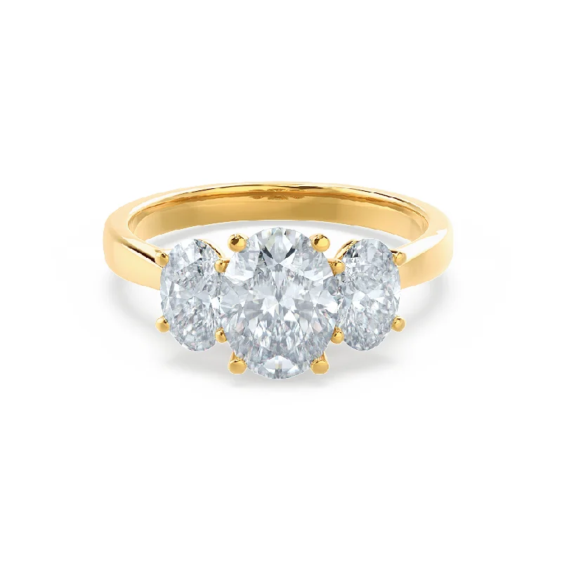 Marquise - cut diamond engagement ring with a split - shank band in platinumEVERDEEN - Oval Moissanite 18k Yellow Gold Trilogy Ring