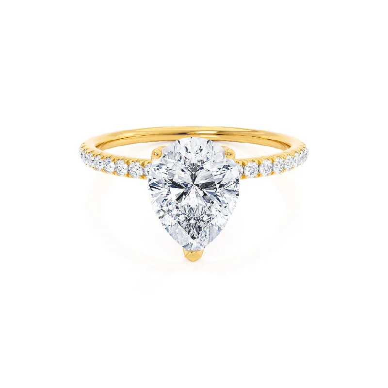 Princess - cut diamond engagement ring with a pavé - set band in platinumMACY - Pear Moissanite 18k Yellow Gold Petite Shoulder Set