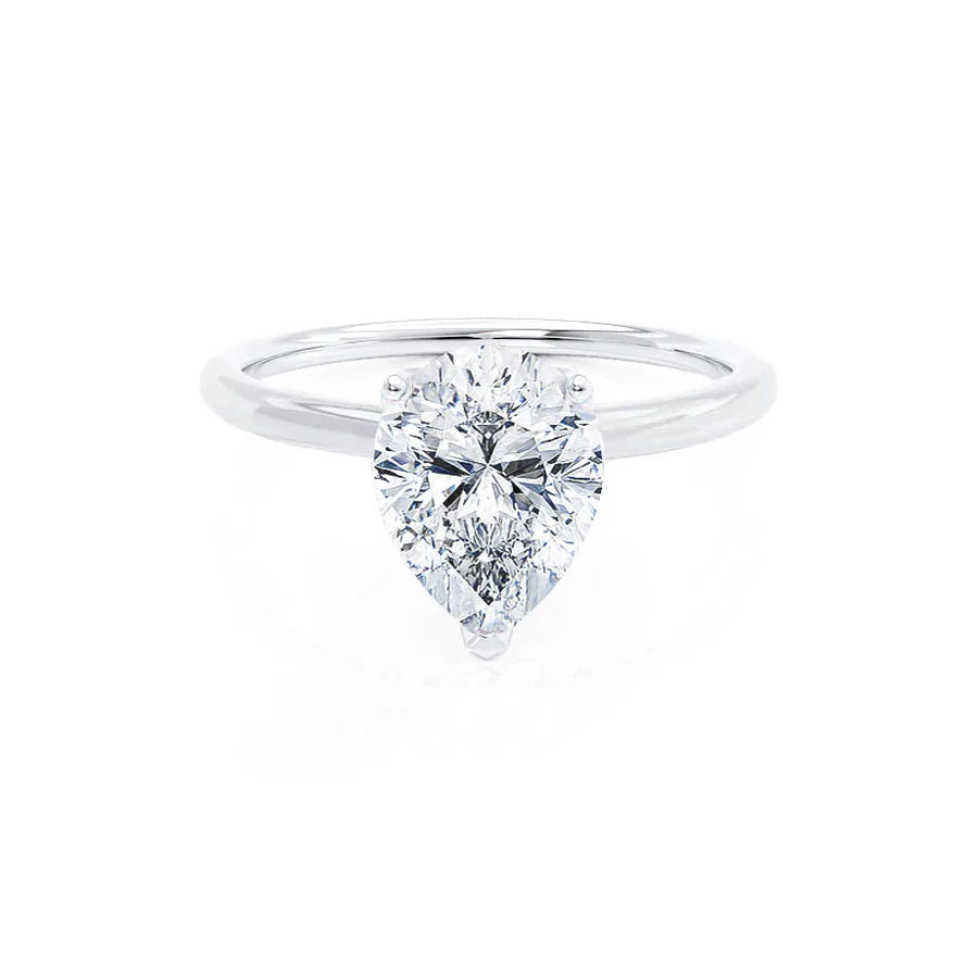 Round - cut diamond engagement ring with a twisted band design in 14K white goldLULU - Pear Lab Diamond Platinum Petite Solitaire