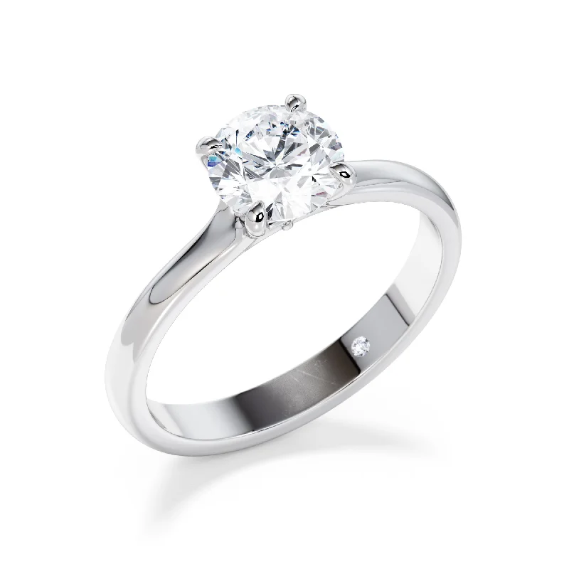 Cushion - cut diamond engagement ring with a halo of moissanite in a silver - plated bandMayfair