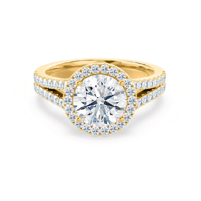 Aquamarine and diamond engagement ring in a 18K white - gold setting with a scalloped edgeAMELIA - Round Moissanite & Diamond 18k Yellow Gold Halo Ring