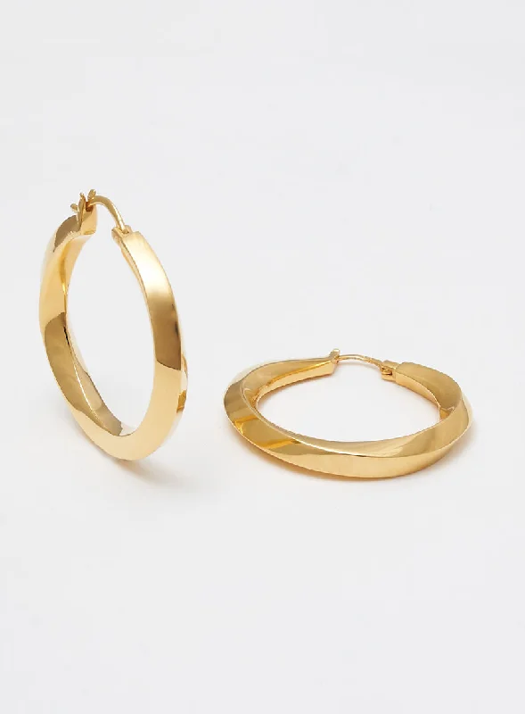 Statement hoop earringsBig Swirl 14K Gold Plated Hoops