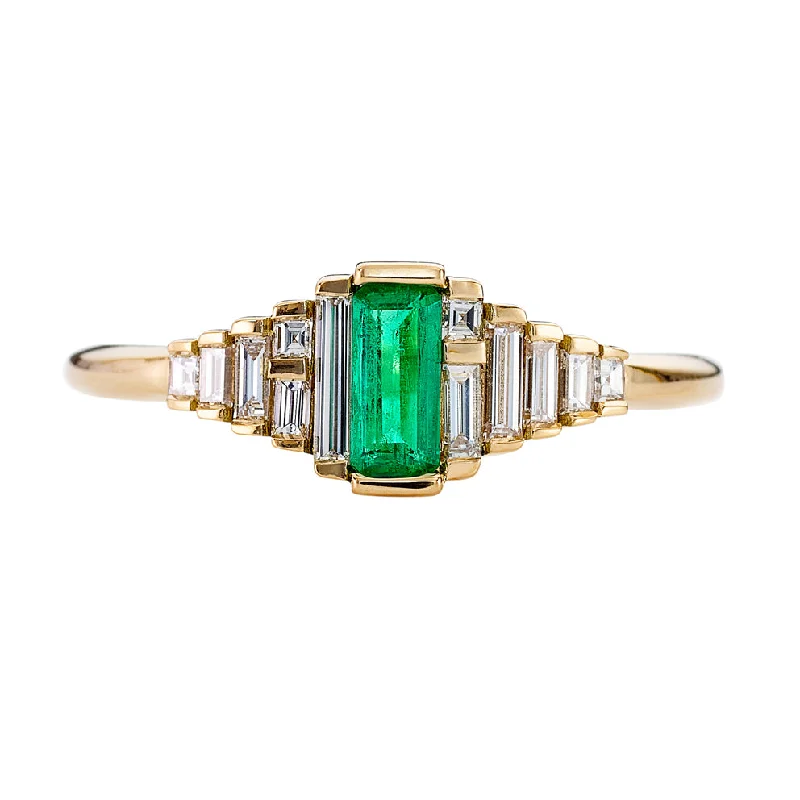 Classic Round Cut Engagement Rings with Platinum Prongs and Halo Setting for Timeless EleganceDainty Emerald Engagement Ring with Needle Baguette Diamonds