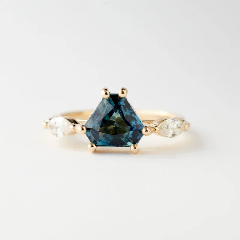 Solitaire Engagement Rings with a High - Clarity Round Diamond and Tapered BandHarley Ring - 2.10 Carat Teal Blue Radiant Shield Cut Sapphire