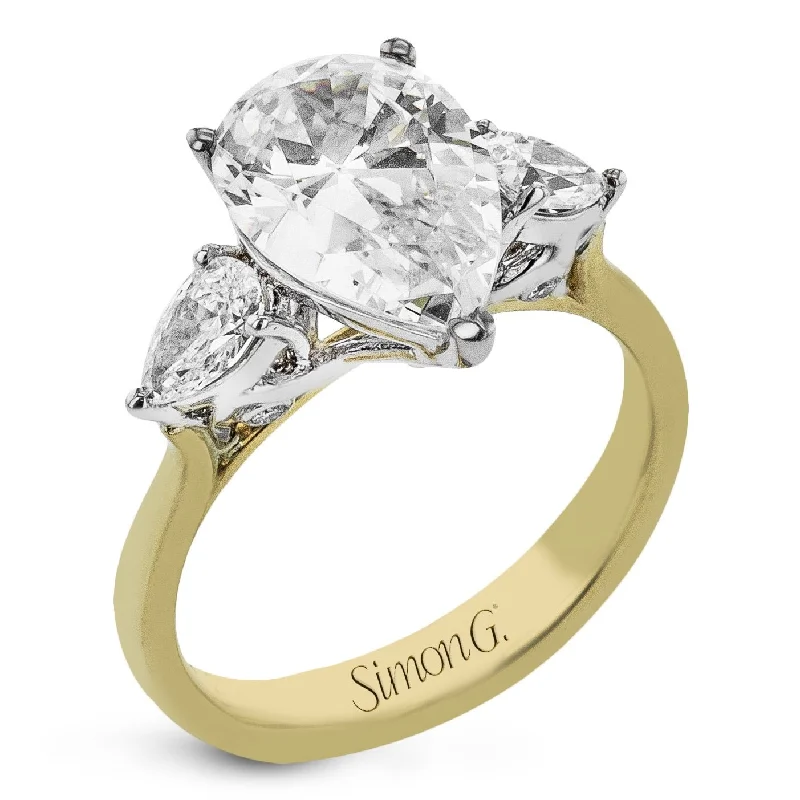 Marquise Cut Engagement Rings with a Channel - Set Diamond BandPear-cut Three-stone Engagement Ring in 18k Gold with Diamonds