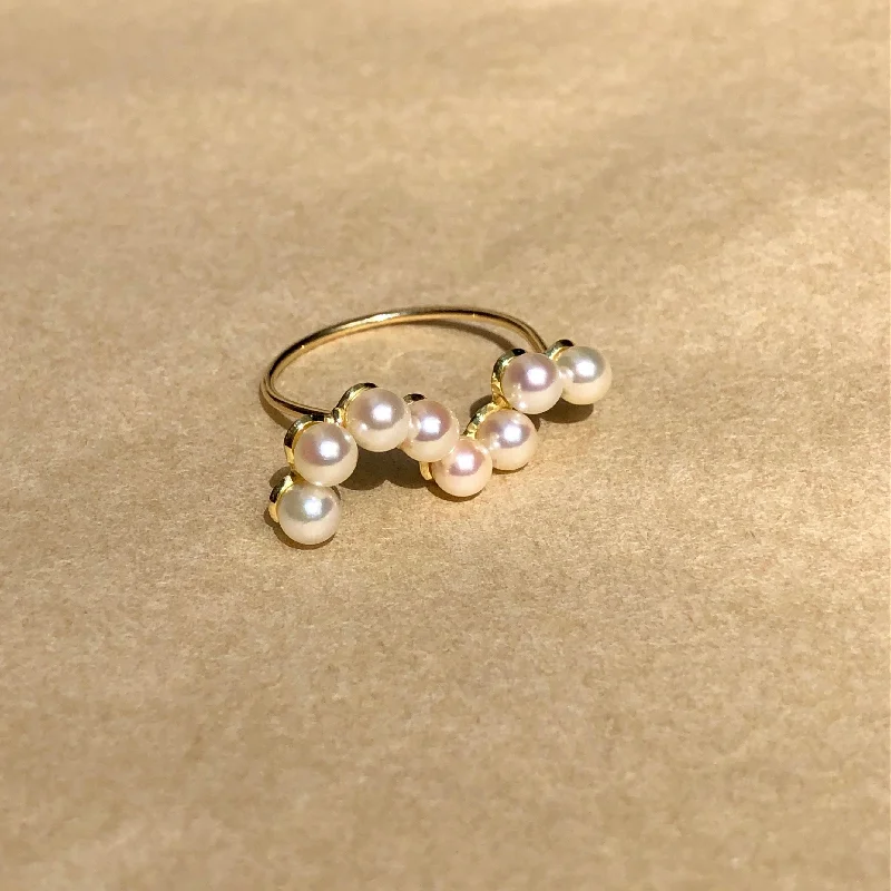 Emerald Gemstone Rings Set in Platinum with Filigree Work for a Vintage - Inspired LookFine Curves 18K Gold Ring w. Pearls